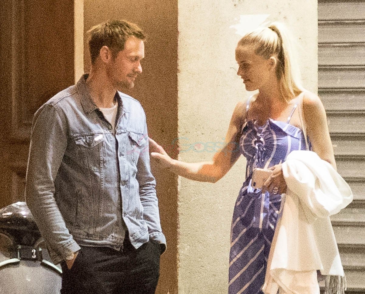 Alexander Skarsgard in Paris with unidentified woman who is not Charlize Theron