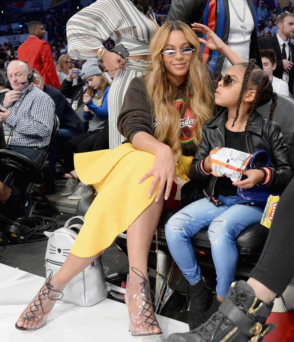 Blue Ivy Carter and Beyoncé sit courtside at the NBA All-Star game