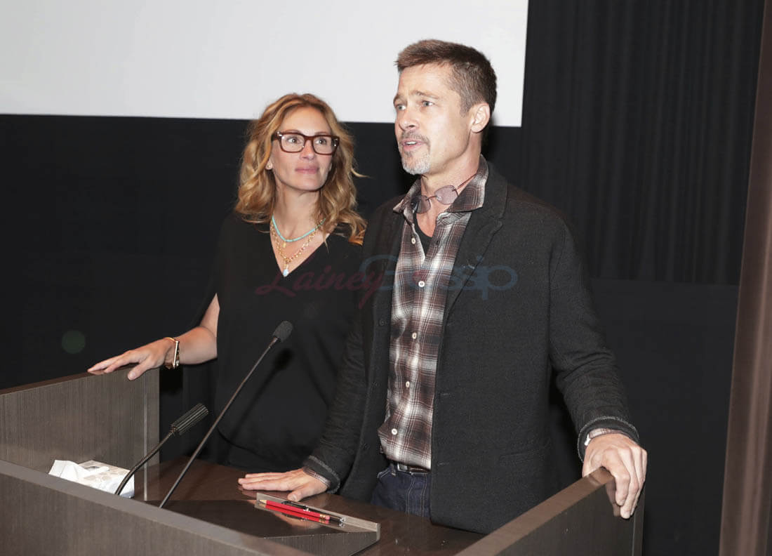Brad Pitt looks pale and drawn in new photos at Moonlight screening with Julia Roberts