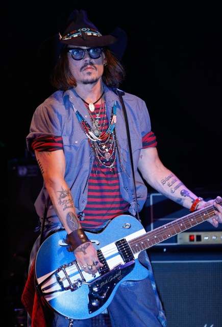 Johnny Depp performs as a guest guitarist onstage during the first ever Jameson Petty Fest West at El Rey Theatre