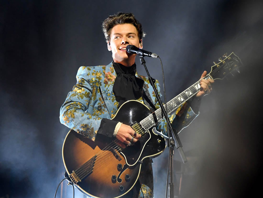 Harry Styles is still hot as he shows support for LGBTQ community with pride flag at ...