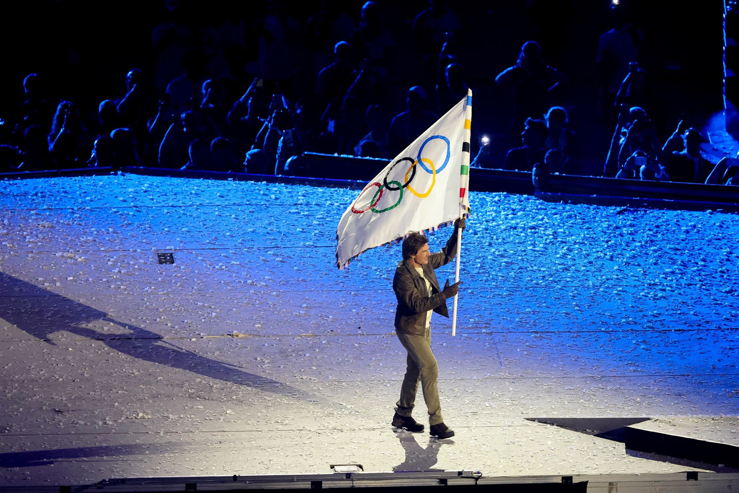 Tom Cruise delivering the Olympic flag from Paris to LA was as corny