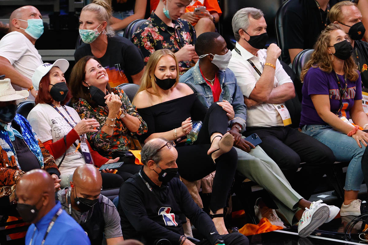 Adele goes glam in Louis Vuitton at NBA game with Rich Paul