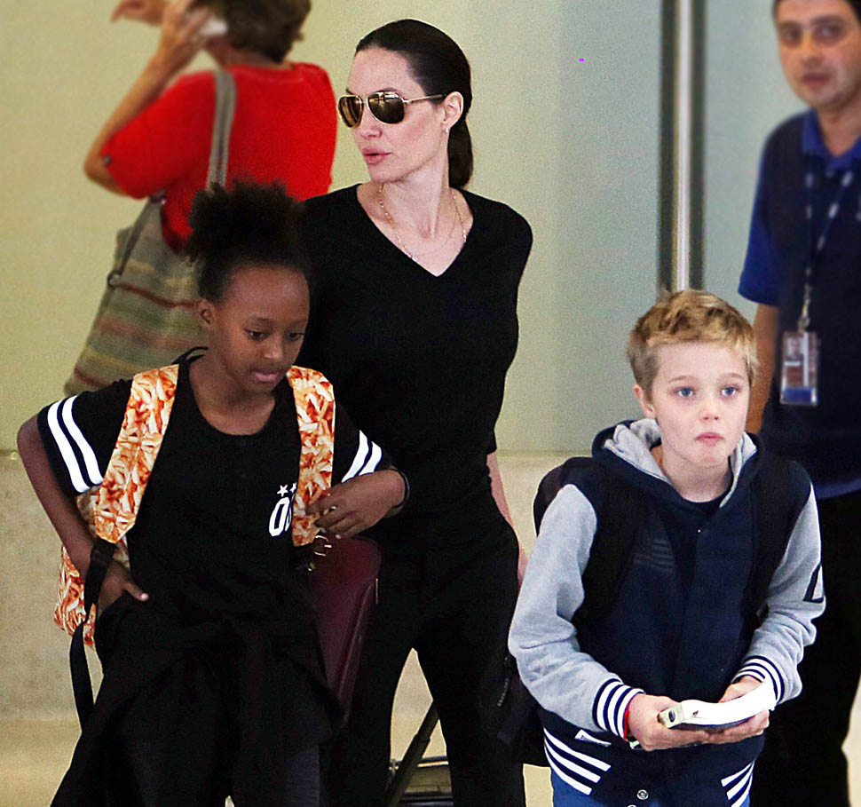 Angelina Jolie And Maddox At LAX - LA - Harper's BAZAAR Malaysia