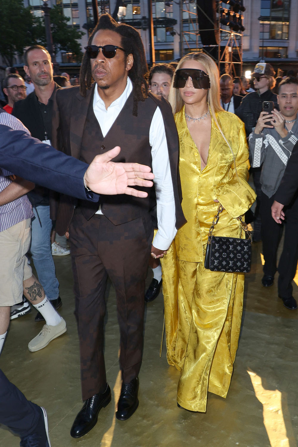Rihanna & ASAP Rocky arriving at the Louis Vuitton SS24 show by