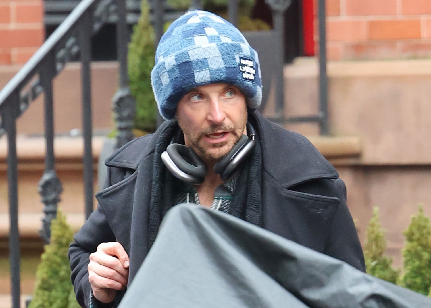 Bradley Cooper Heads Out Of New York After Picking Up Three Oscar   Bradley Cooper 24jan24 0001 