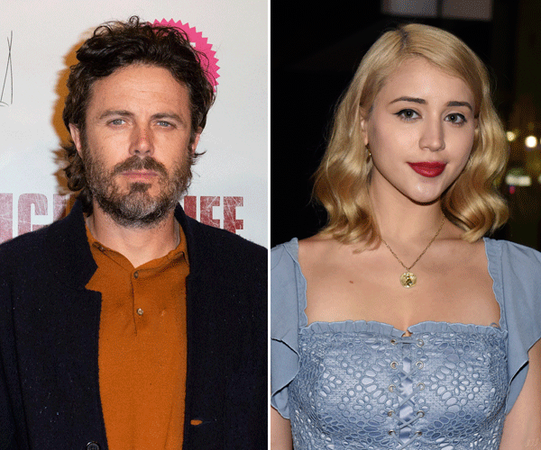 Actor Casey Affleck and his girlfriend, Caylee Cowan, pose