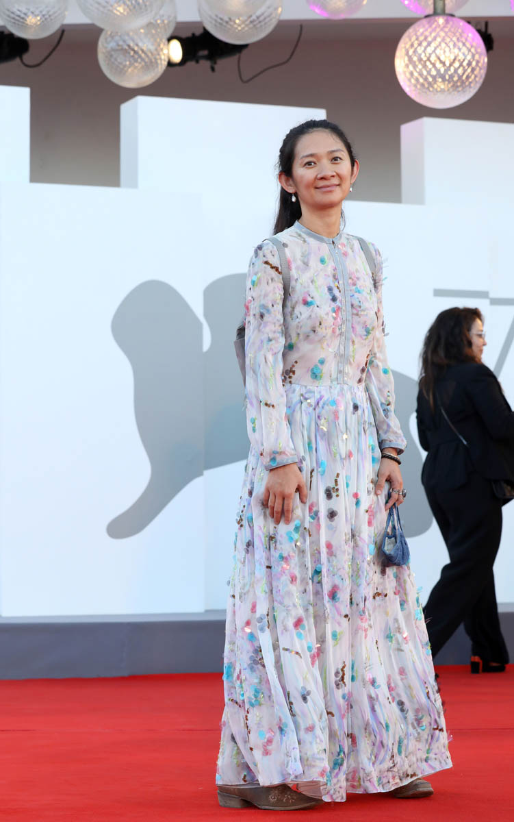 Outfit of the Week: Chloe Zhao and her backpack at the Venice Film Festival  opening night gala