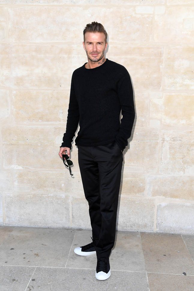 David Beckham has reclaimed some hot at Louis Vuitton show in Paris as  Victoria Beckham steps out in New York in multiple colourful looks