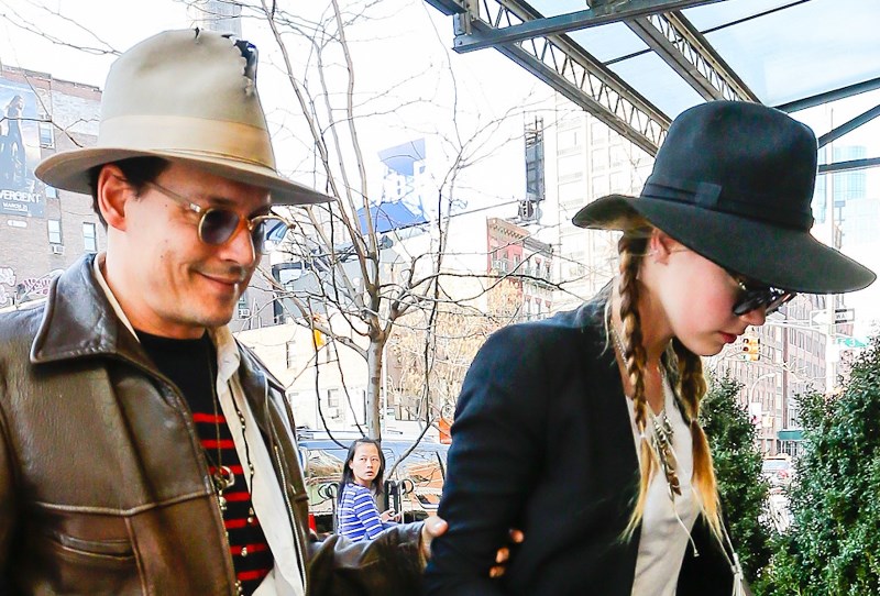 Johnny Depp matches hats with Amber Heard as Transcendence bombs at the ...