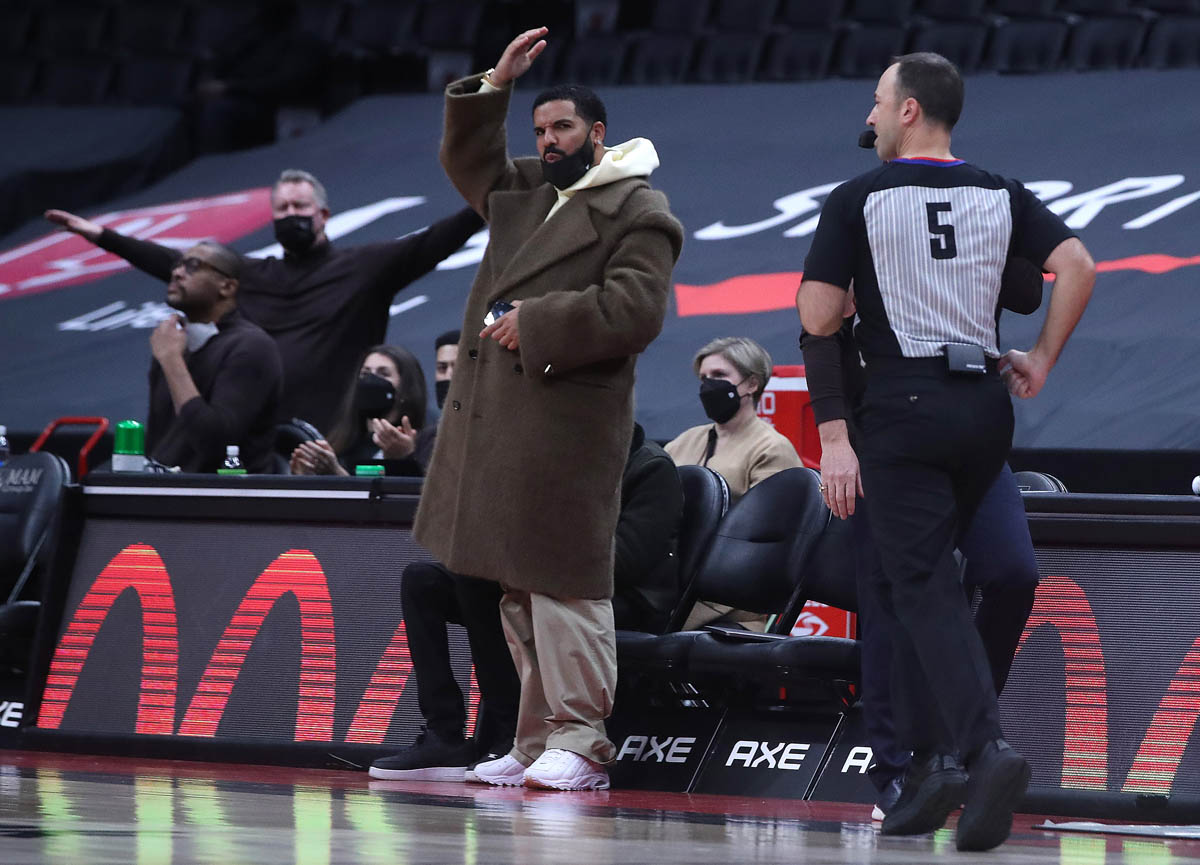 Raptors ambassador Drake sat courtside at the Raptors game last night and  Twitter produces comedy over Rihanna's pregnancy