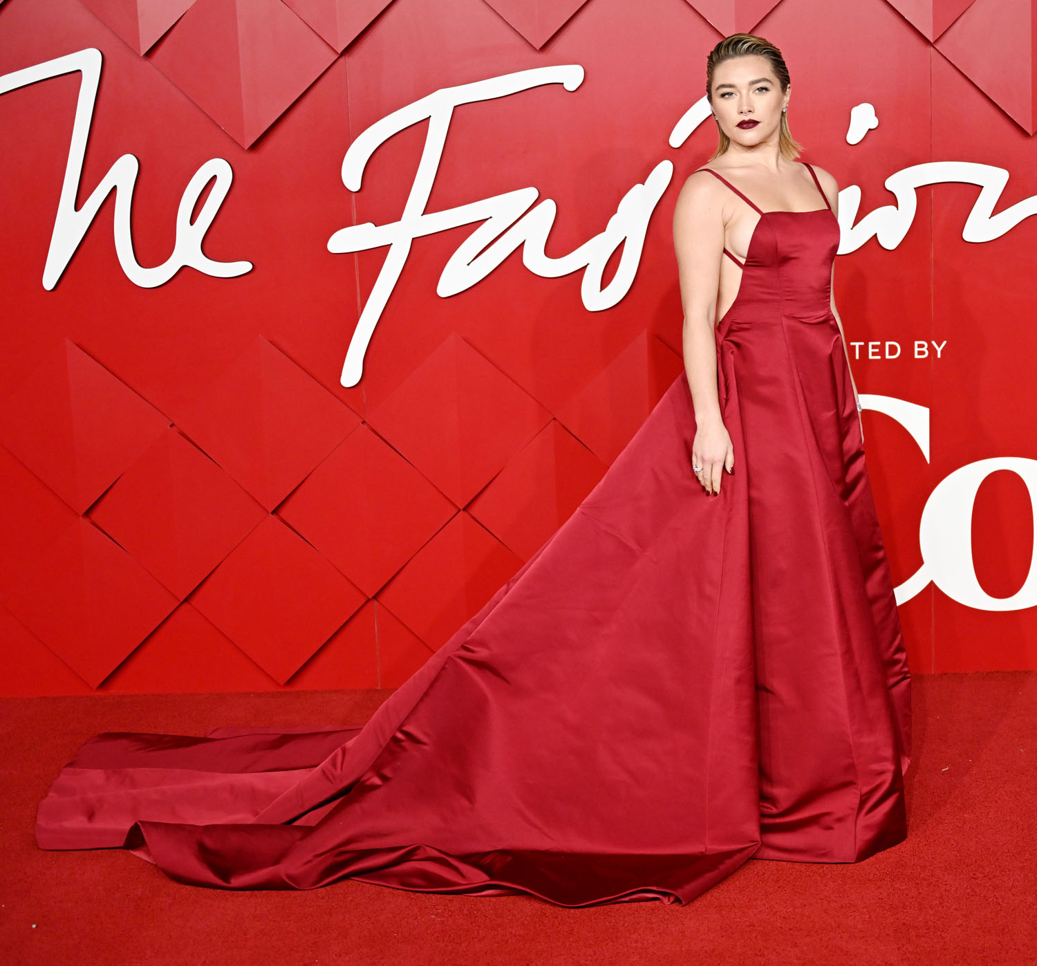 British Fashion Awards 2022: Florence Pugh stuns in red Valentino gown on  red carpet - Entertainment News