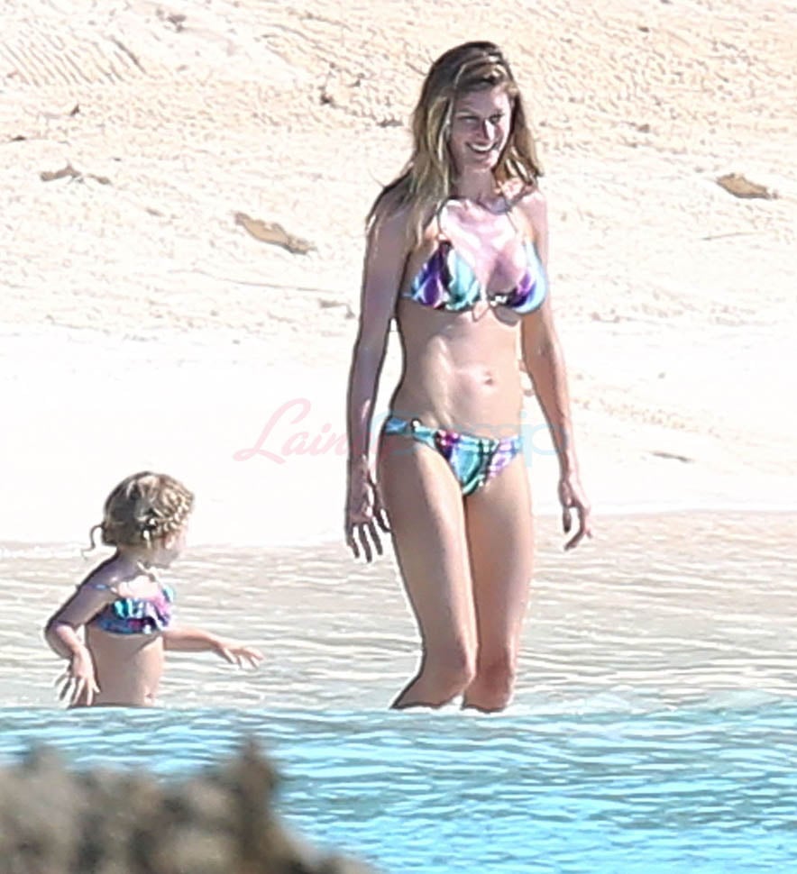Gisele Bündchen brings her luggage to the beach in new Louis