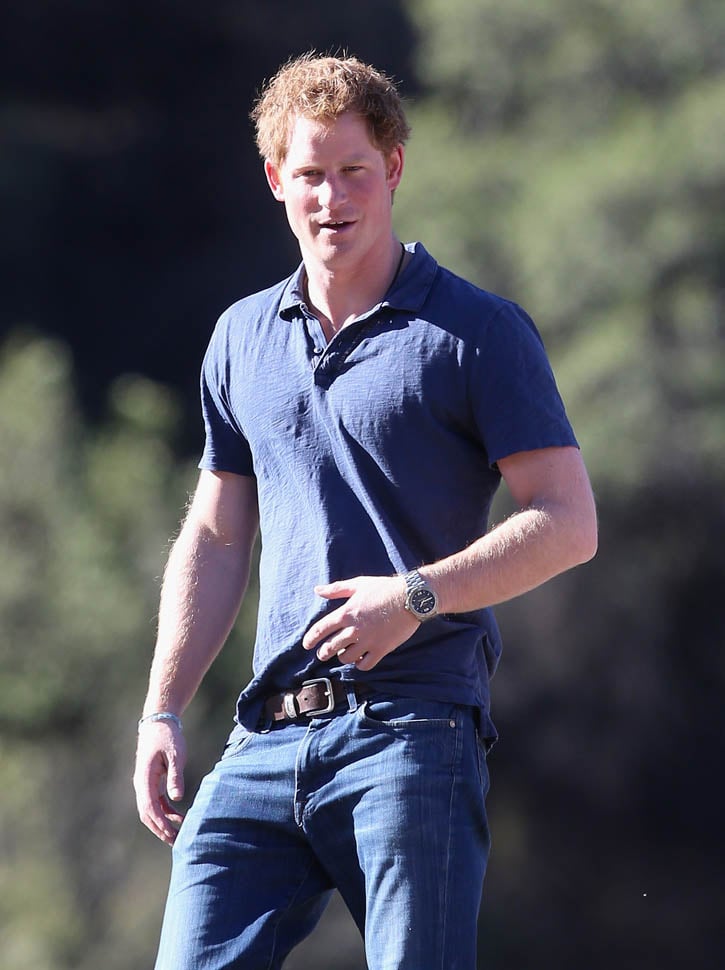 Prince Harry dances, pouts, and plays with children, animals, and ...