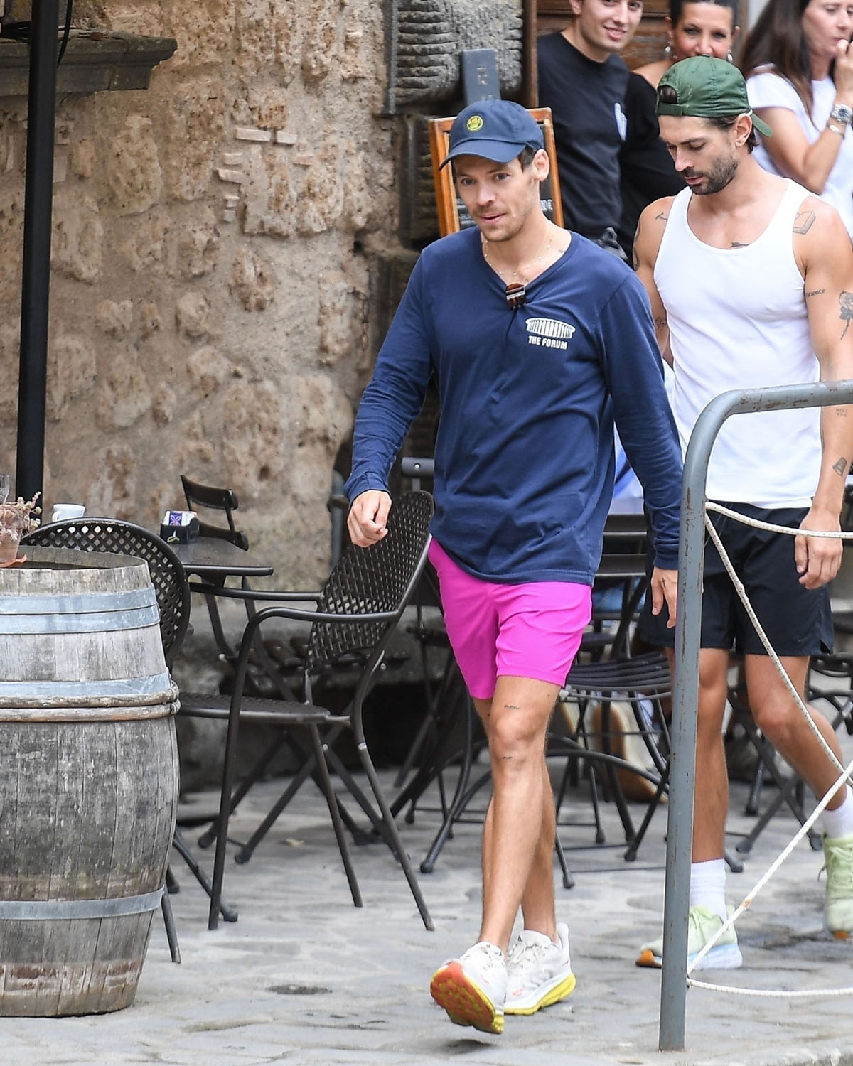 Harry Styles takes his Olivia tattoo for a jog in Italy and raises