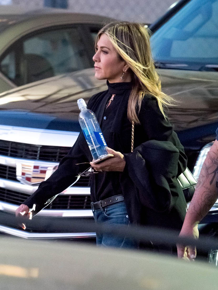 Jennifer Aniston photographed with smartwater bottle at 
