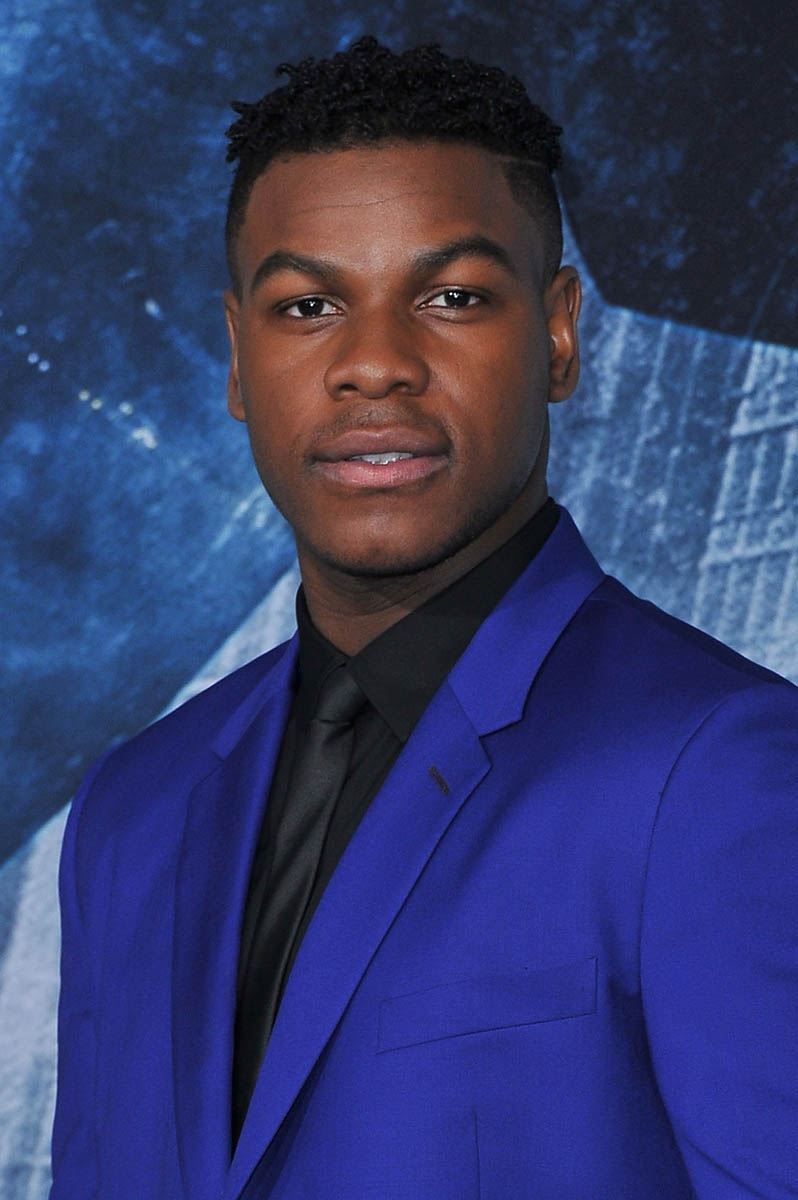 Focusing on John Boyega and puppies in interview for Pacific Rim: Uprising