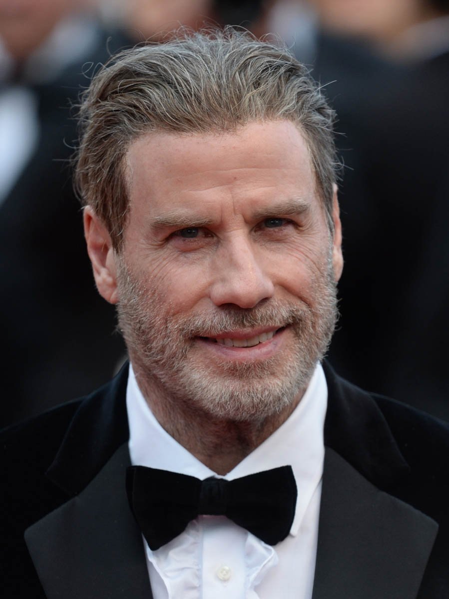 John Travolta’s Cannes hair and Cannes moves
