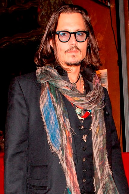 Johnny Depp wears only 2 scarves at David Furnish’s 50th Birthday party