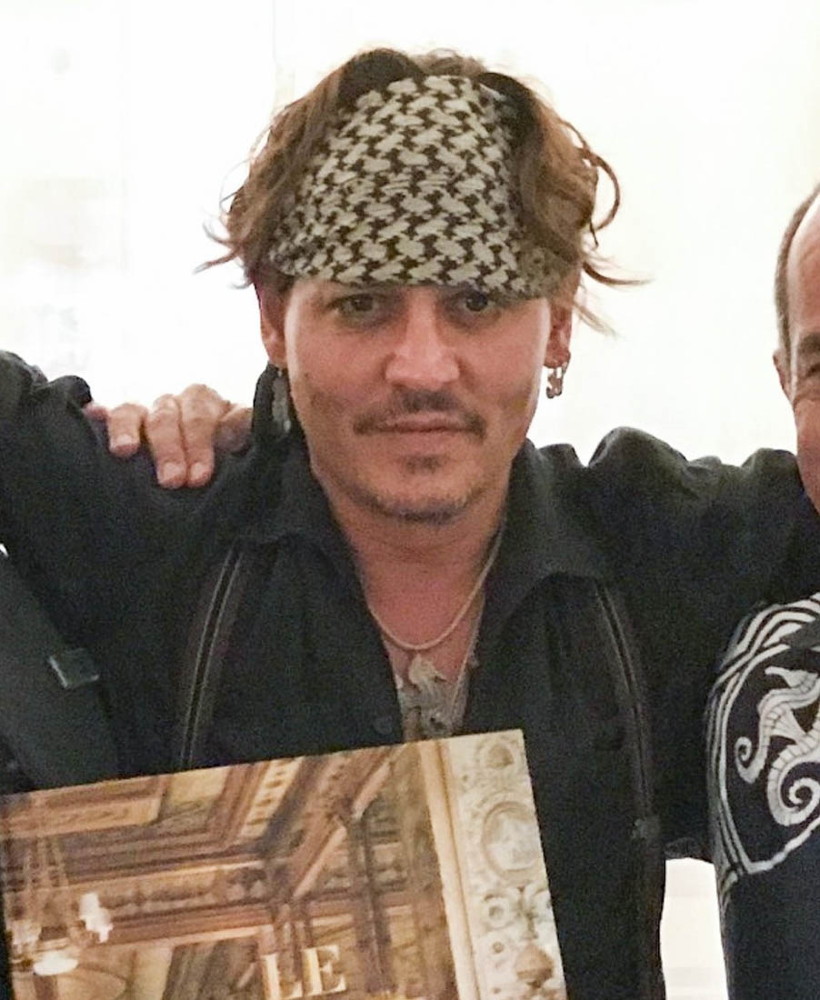 Johnny Depp celebrates getting Disney money at the Brando in Tahiti