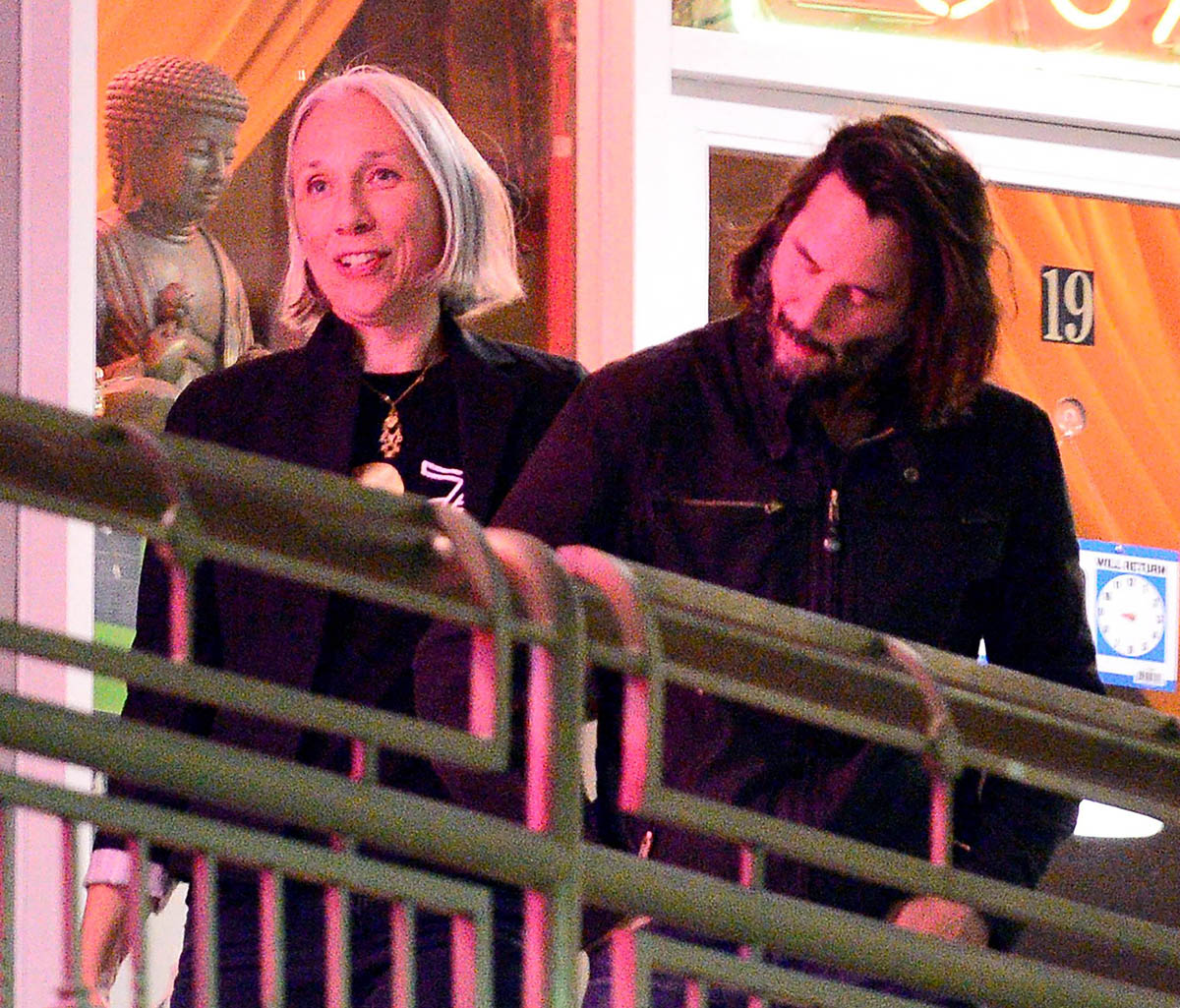 Keanu Reeves and girlfriend Alexandra Grant link arms in LA