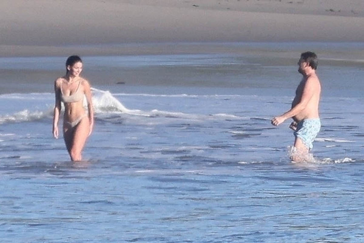 Leonardo DiCaprio & Camila Morrone Go for a Walk on the Beach in