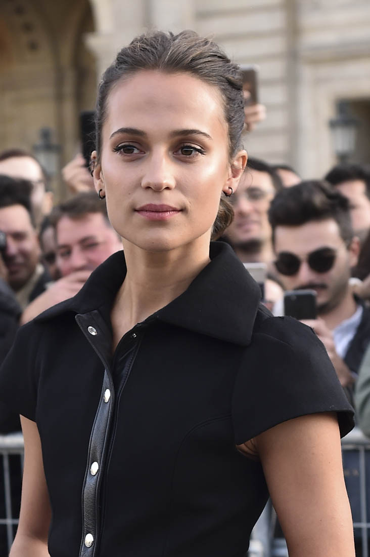 Alicia Vikander at Paris Fashion week as rumoured fiance Michael Fassbender  promotes The Snowman in London