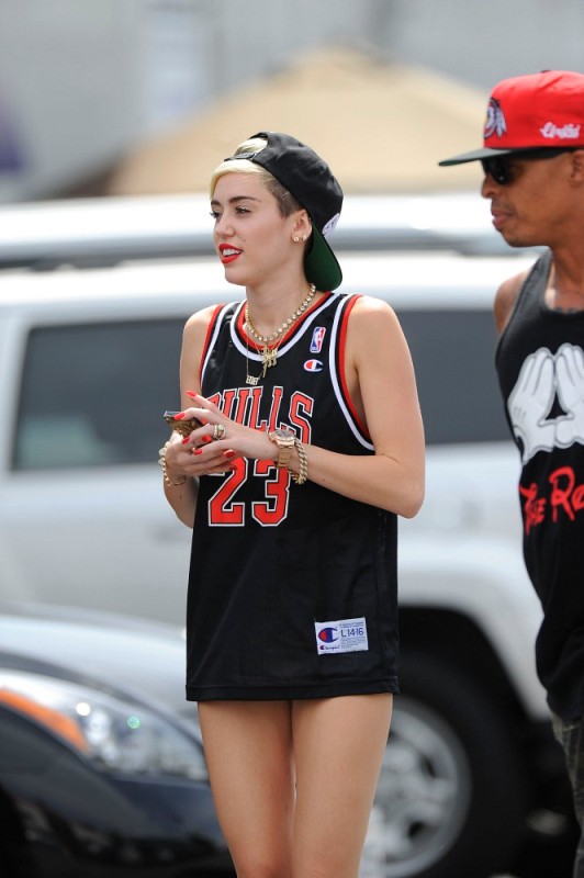 Miley Cyrus' SEXY Bulls Jersey Style — Struts Around In Short-Shorts –  Hollywood Life