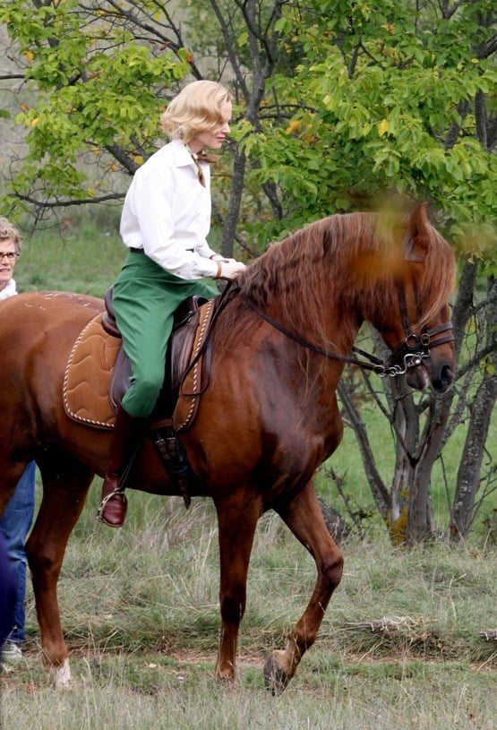 Nicole Kidman wears green riding pants as Princess Grace