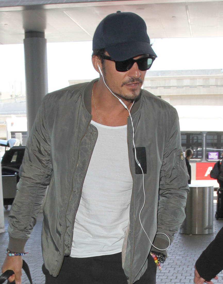 Orlando Bloom at LAX as it's reported he might propose to Katy Perry ...