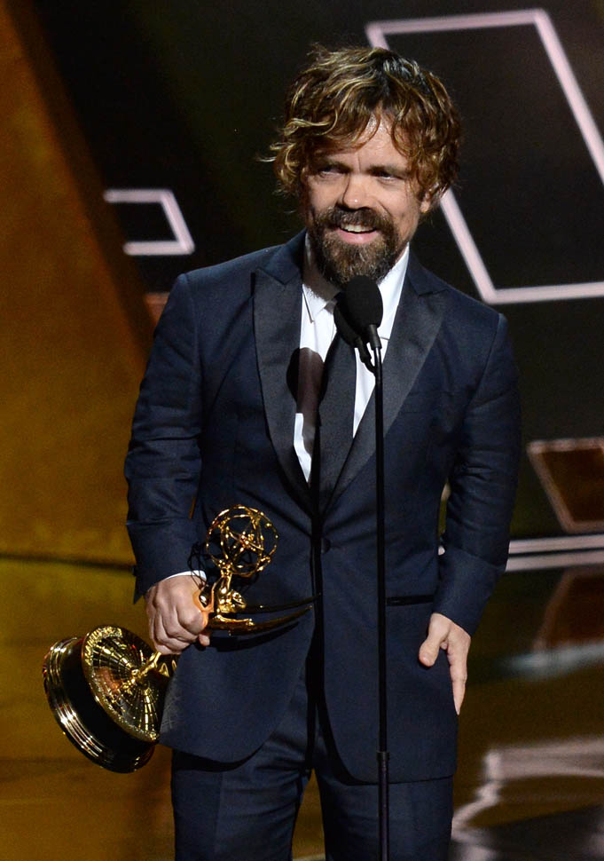 Cast and crew of Game of Thrones, winners of the award for Outstanding  Writing for a Drama Series, appear backstage during the 70th annual  Primetime Emmy Awards at the Microsoft Theater in