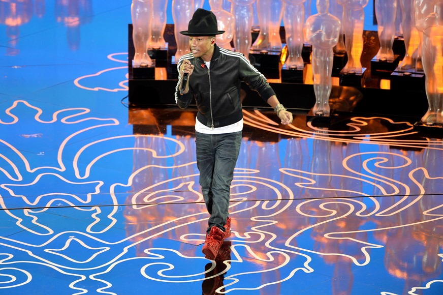 Pharrell Williams takes a victory lap at the Loewe show in Paris