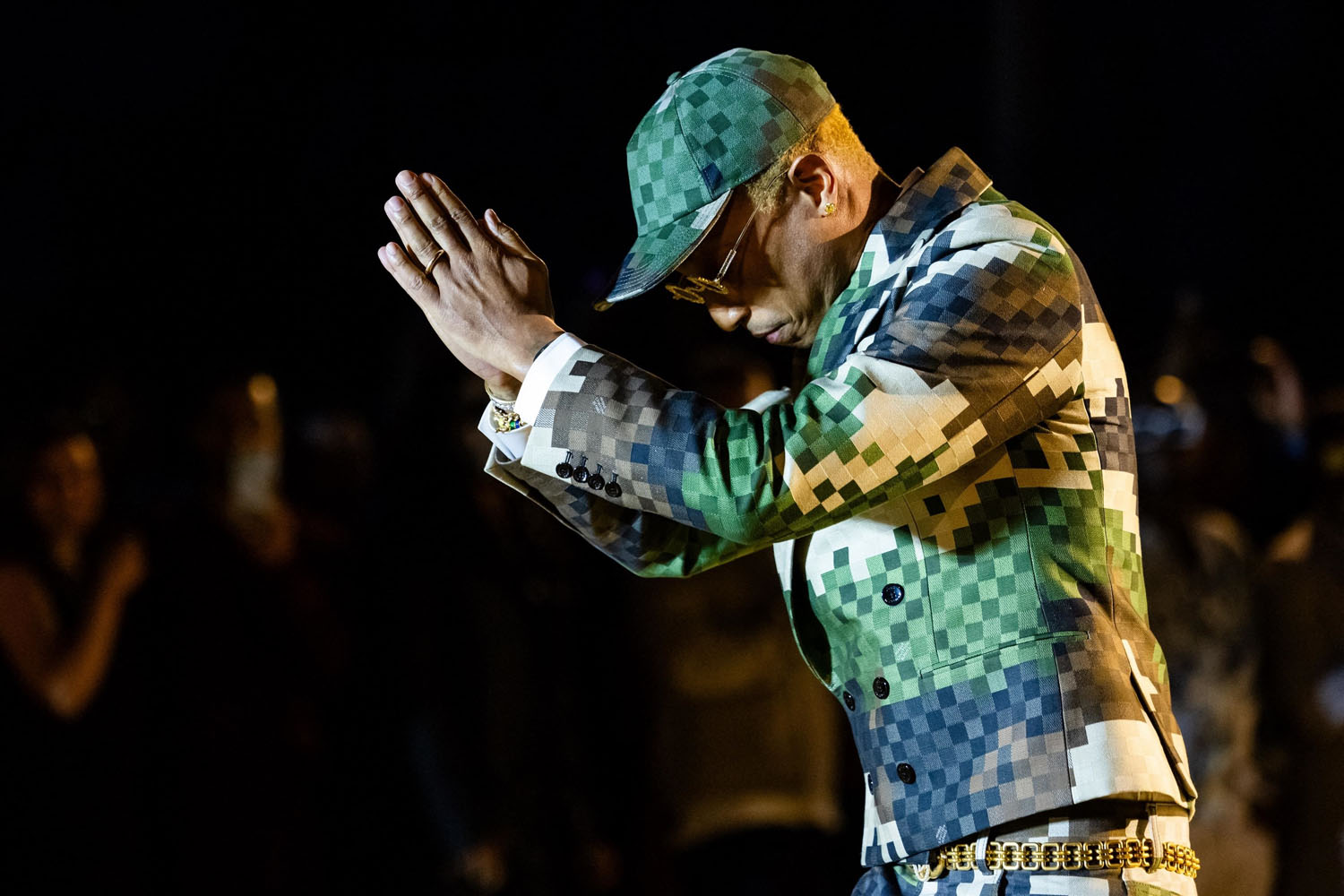 Pharrell Williams takes a victory lap at the Loewe show in Paris