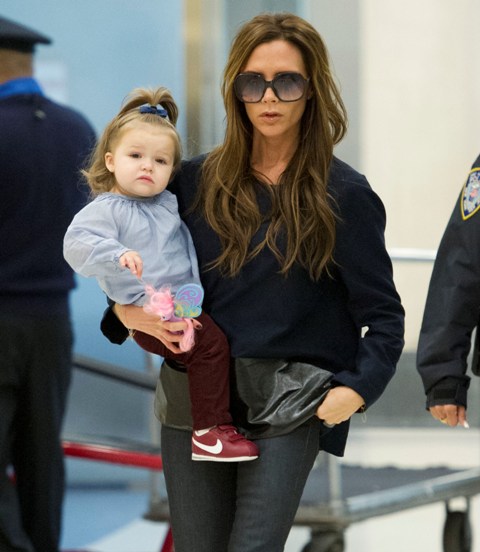 Victoria Beckham with Harper Seven in Pebbles hair at JFK