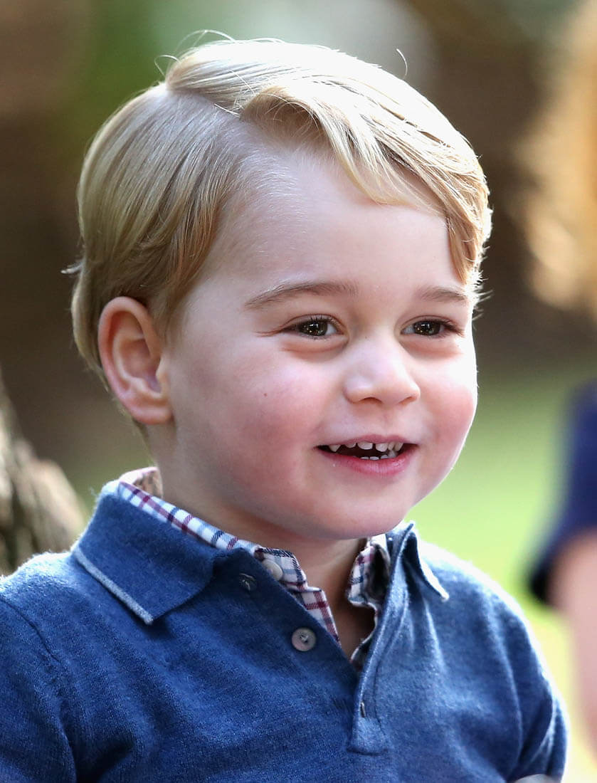 Prince George loves the bubble maker and Princess Charlotte sits on a ...