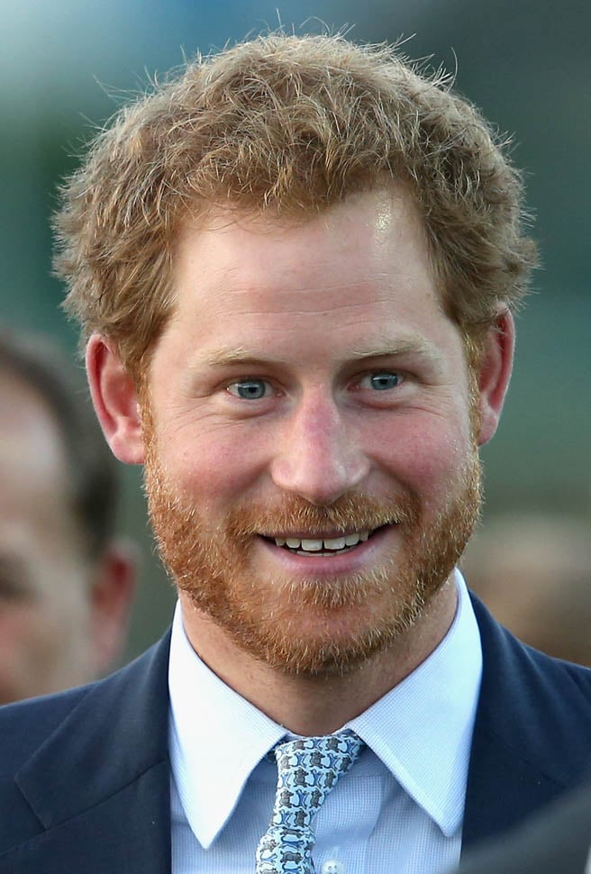 Prince Harry presented with personalised boots at Paignton Rugby Club ...