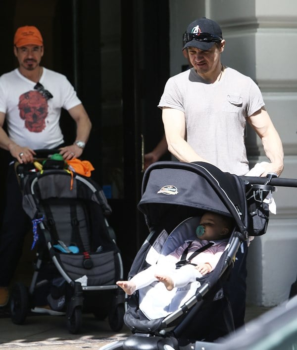 Robert Downey Jr and Jeremy Renner with their kids in 