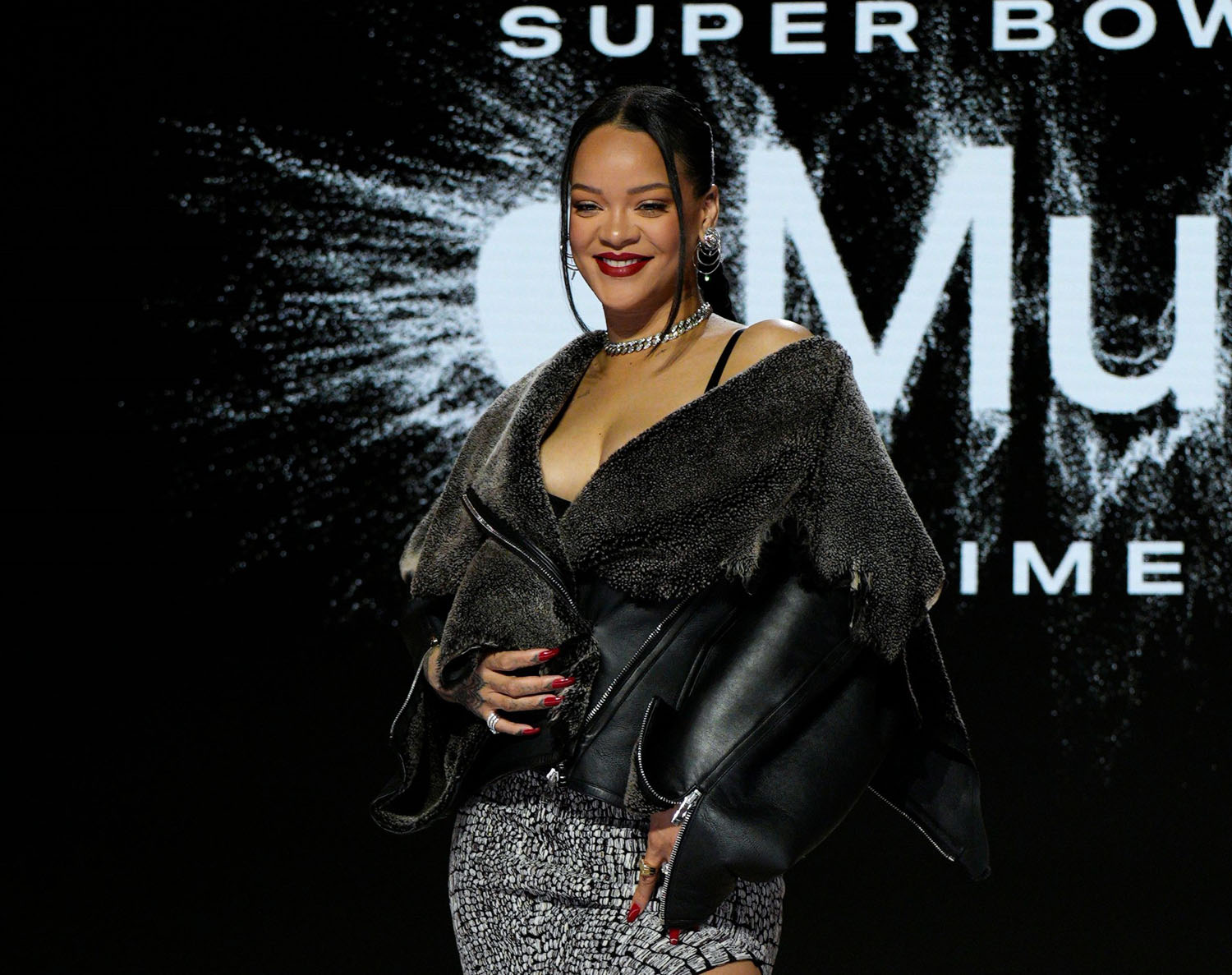 Phoenix, Arizona, Feb. 12, 2023, Rihanna poses for photos after the Super  Bowl LVII Apple Music Halftime Show press conference held at the Phoenix  Convention Center on Feb. 9, 2023. Super Bowl