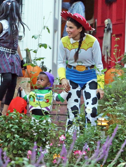 Sandra Bullock dresses up as cowgirl Jessie with son Louis for Halloween