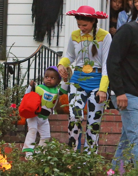 Sandra Bullock dresses up as cowgirl Jessie with son Louis for Halloween