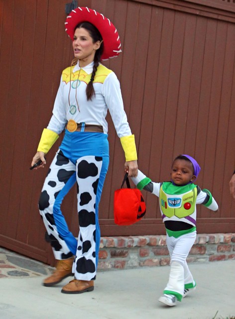 Sandra Bullock dresses up as cowgirl Jessie with son Louis for Halloween