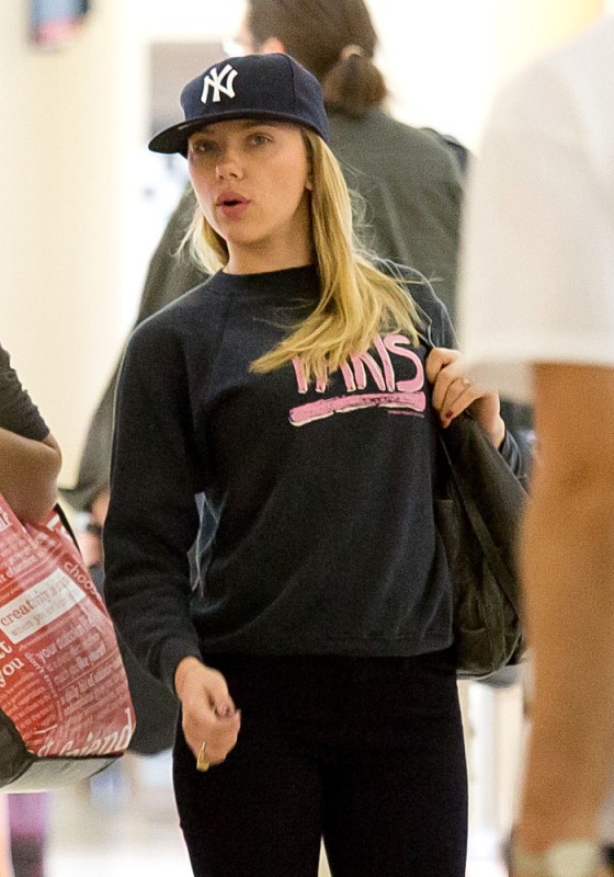 Scarlett Johansson is busy and looks super hot at LAX 