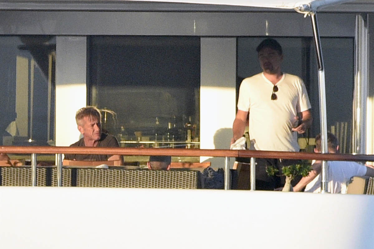 Leonardo DiCaprio and Sean Penn on a yacht in Sardinia with their much younger girlfriends