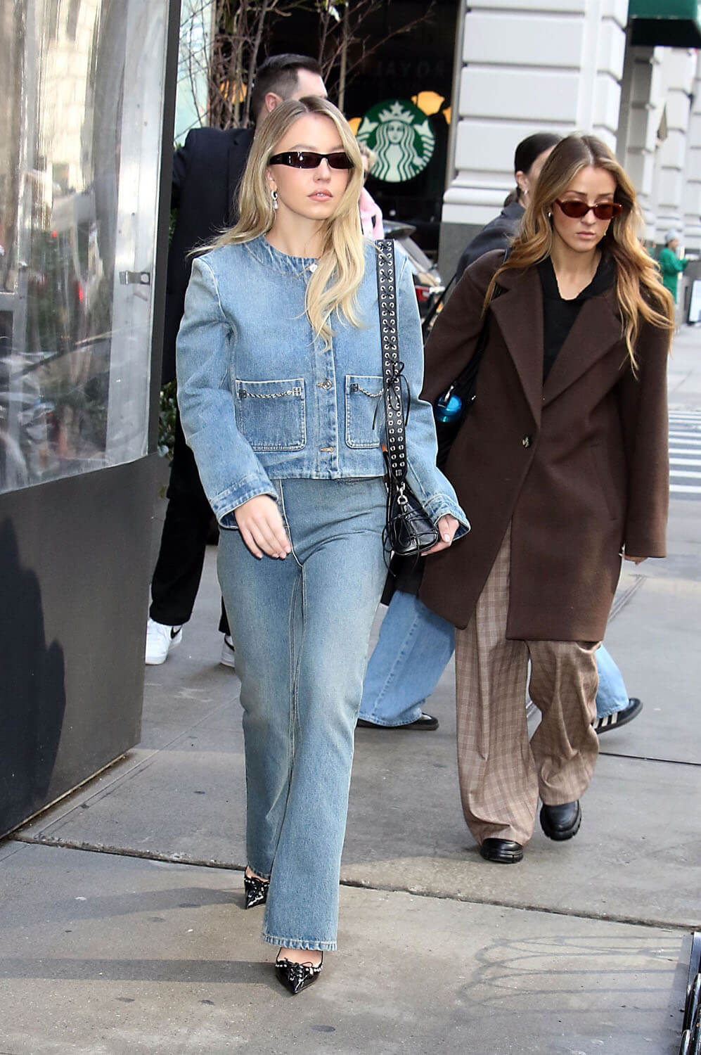Sydney Sweeney oozes confidence as she strolls through New York City in a  double denim look ahead of her hosting SNL
