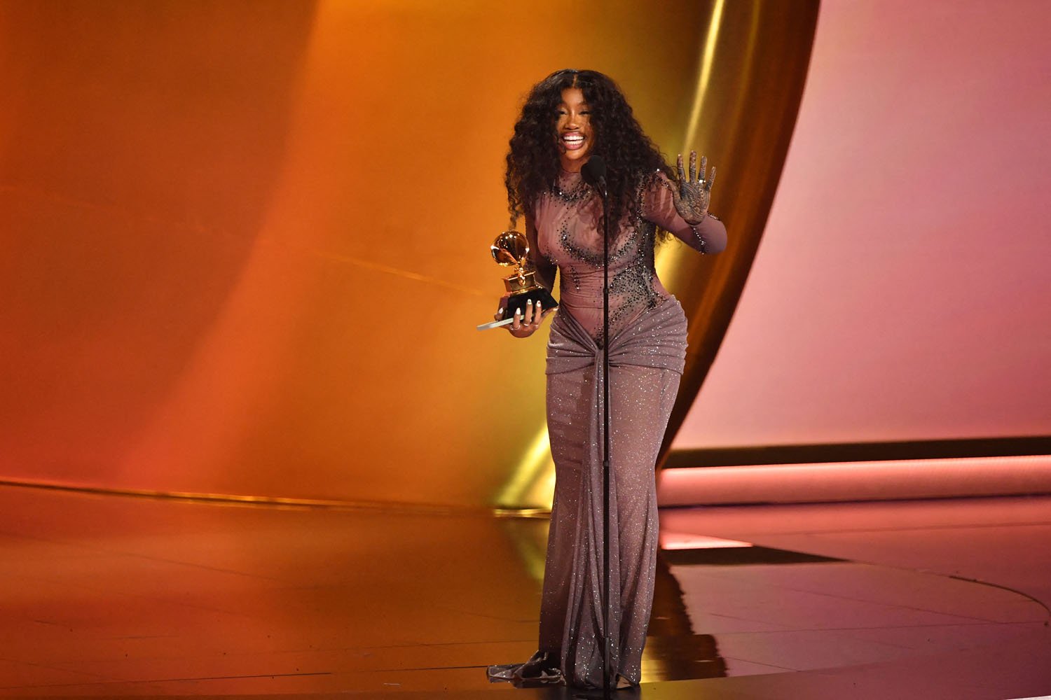 How will SZA's haul at the Grammys, where she won 3 of her 9