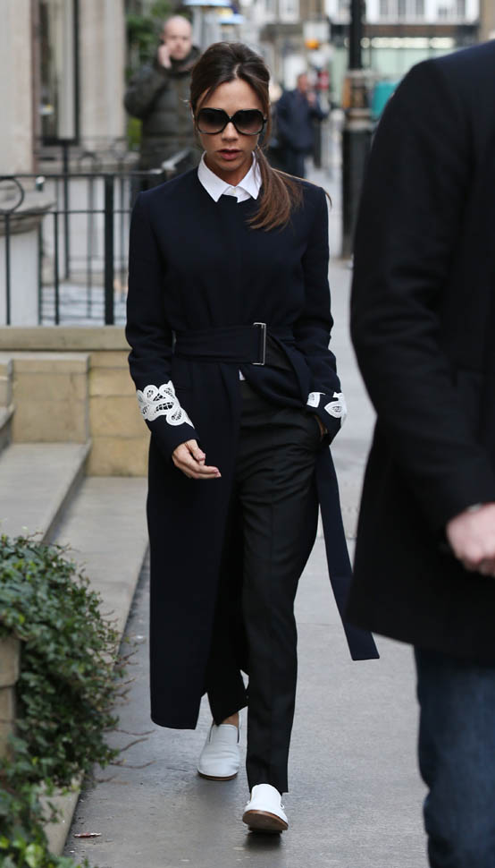 Victoria Beckham's gorgeous outfit and white kicks during London ...