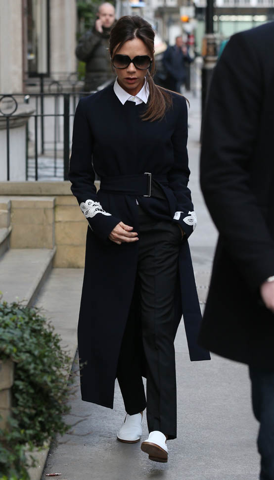 Victoria Beckham's gorgeous outfit and white kicks during London ...