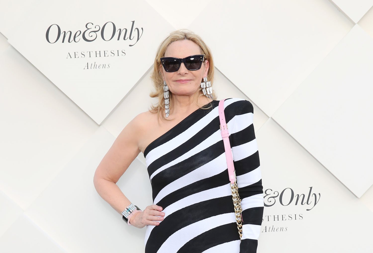 Kim Cattrall looks incredible in this clingy black and white dress in  Greece and What Else for June 11, 2024