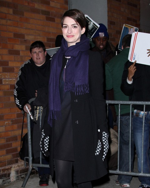 Anne Hathaway wears great gloves arriving at the 'Daily Show' in NYC ...